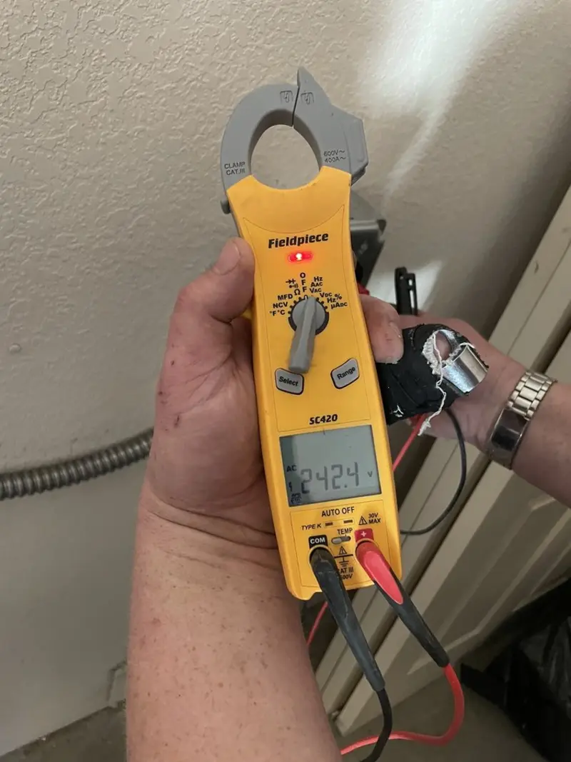 Voltage testing with clamp meter during Hot Tub / Pool Electrical Wiring in Anamosa